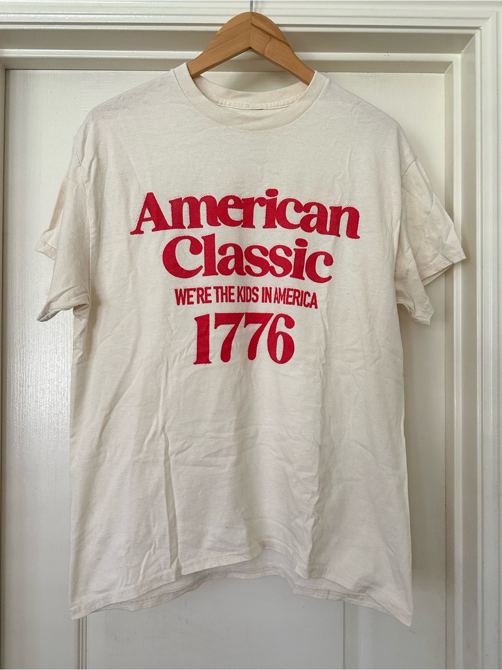 1776 Shop Kristin Jones Americana Tee 
We’re The Kids in America NEW